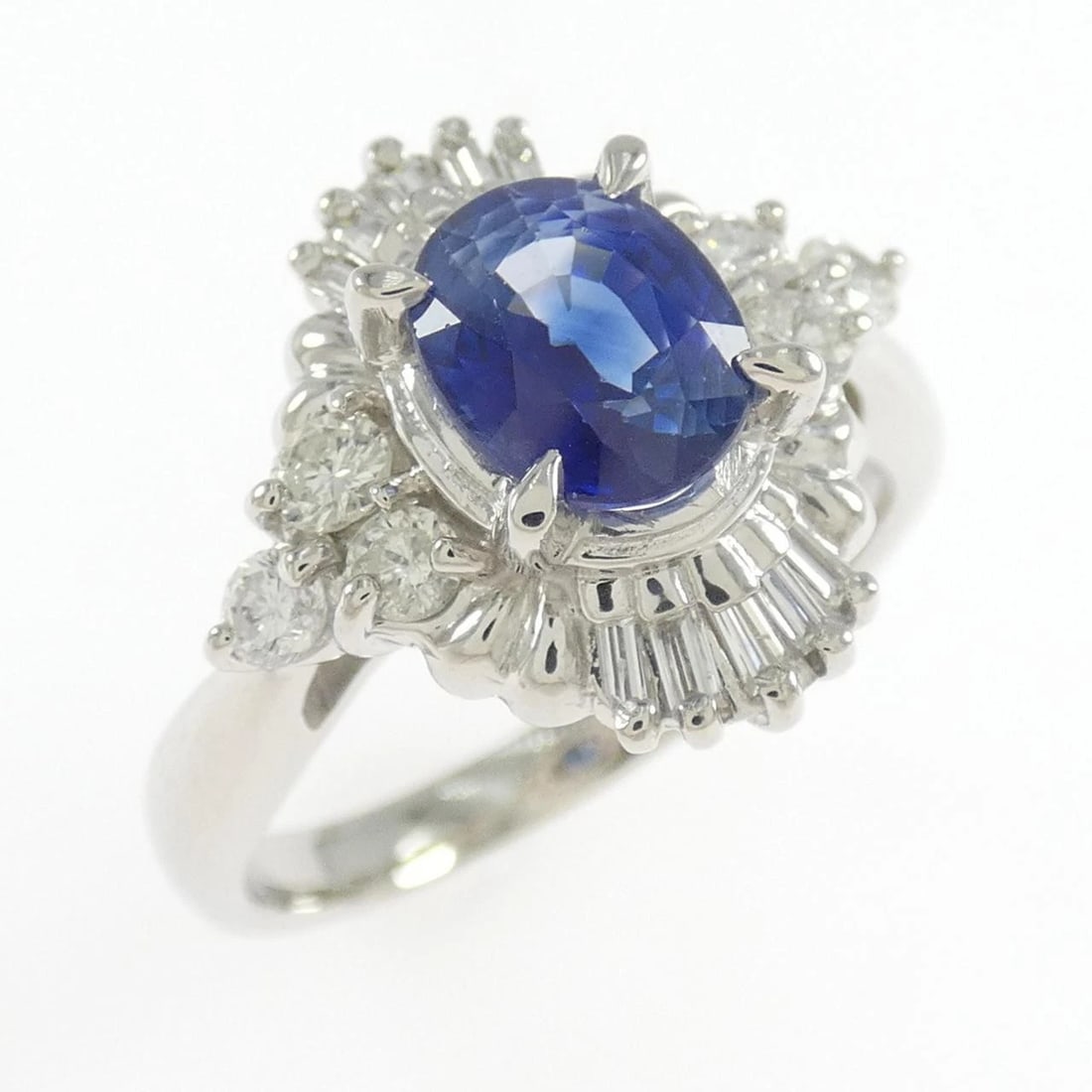 PT900 SAPPHIRE RING: PT900 Sapphire Ring Brand: Unbranded Type: Sapphire Ring Material: Platinum900, Main Stone/Creation Sapphire Secondary Stone Diamond Color: Platinum Size: US 7 3/4 Accessories: None Accessories