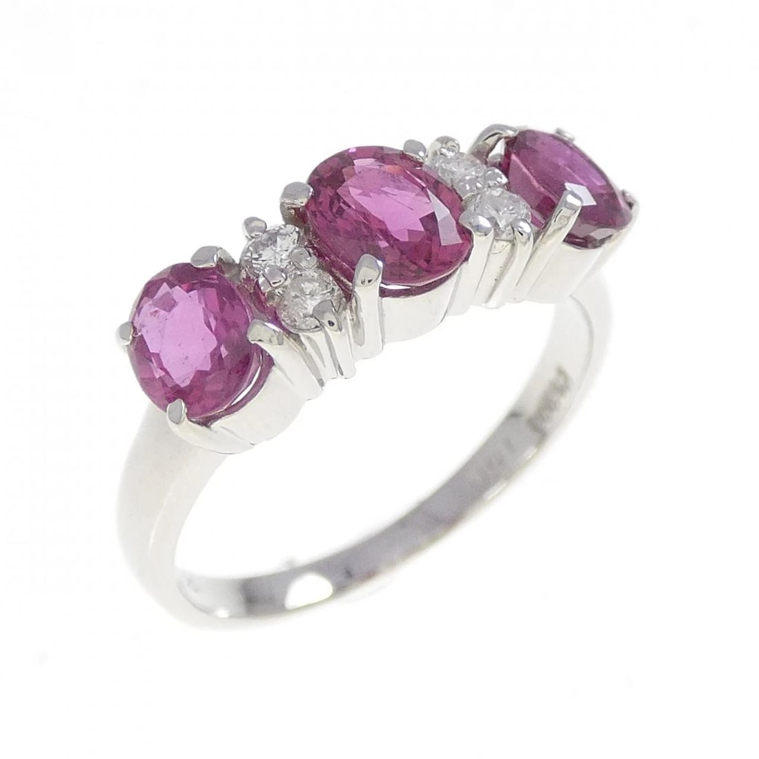 PT900 RUBY RING: PT900 Ruby Ring Brand: Unbranded Type: Ruby Ring Material: Platinum900, Main Stone/Creation Ruby Secondary Stone Diamond Color: Platinum Size: US 1 3/4 Accessories: None Accessories Notice: When