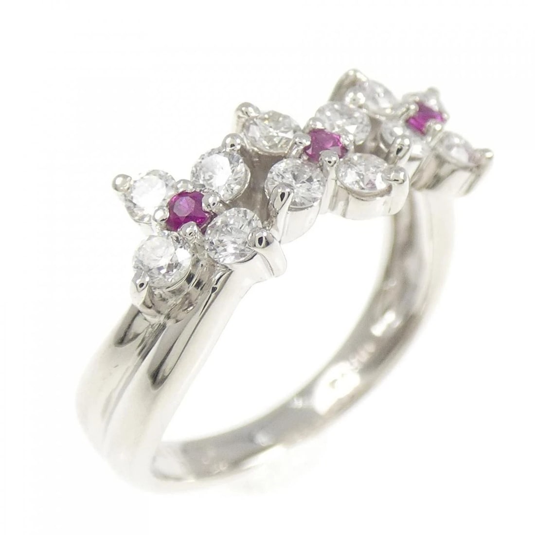 PT900 FLOWER RUBY RING: PT900 Flower Ruby Ring Brand: Unbranded Type: Ruby Ring Material: Platinum900, Main Stone/Creation Ruby Secondary Stone Diamond Color: Platinum Size: US 5 3/4 Accessories: None Accessories Notice: