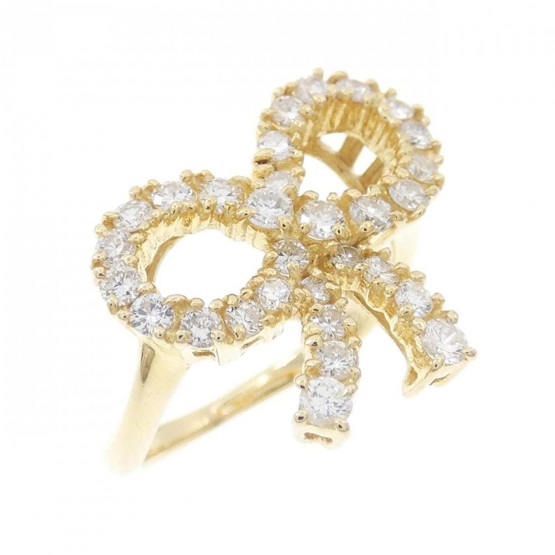 K18YG RIBBON DIAMOND RING: K18YG Ribbon Diamond Ring Brand: Unbranded Type: Diamond Ring Material: 18K Yellow Gold, Main Stone/Creation natural Color: Yellow Gold Size: US 6 1/2 Accessories: None Accessories Notice: When