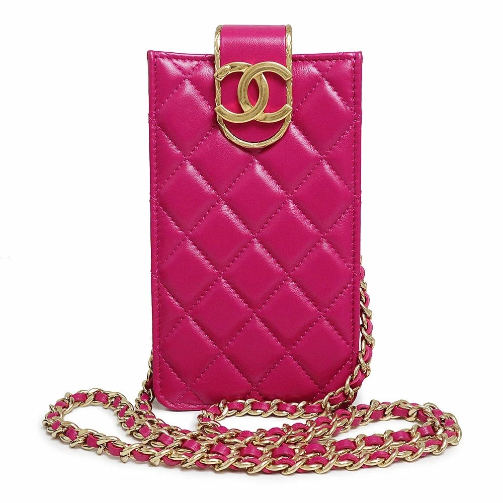CHANEL MATELASSÉ COCO MARK PHONE HOLDER SHOULDER BAG: CHANEL Matelassé Coco Mark Phone Holder Shoulder Bag Brand: CHANEL Type: Handbag Material: Lambskin (Sheepskin) Color: Fuchsia Pink Size: W: 9.5cm x H: 16.5cm x D: 3cm Accessories: None Ac