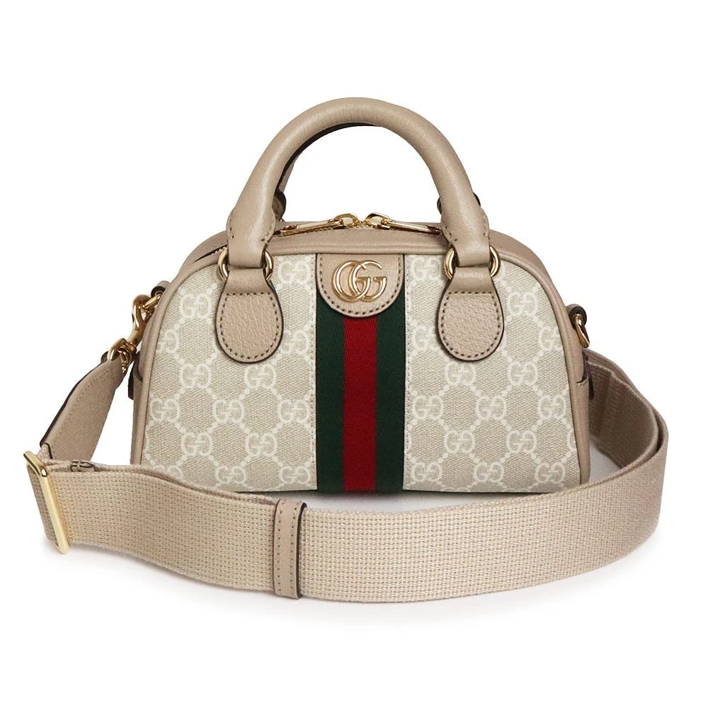 GUCCI OPHIDIA GG MINI IN GG SUPREME: GUCCI Ophidia GG Mini in GG Supreme Brand: GUCCI Type: Handbag Material: Gg Supreme Canvas Color: Beige X White Size: W: 21.5cm x H: 12cm x D: 10cm Handle: 21cm Accessories: None Accessori