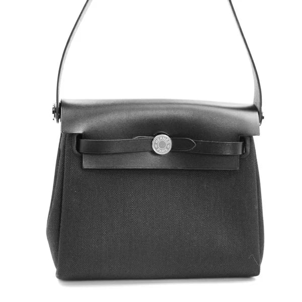 HERMES EVELYNE BAG ZIP MINI BLACK: Hermes Evelyne Bag Zip Mini Black Brand: Hermes Type: Handbag Material: Toile Military X Bash Hunter Color: Black Size: W:20cm × H:18cm × D:8cm / Shoulder strap length: 103cm Accessories: None