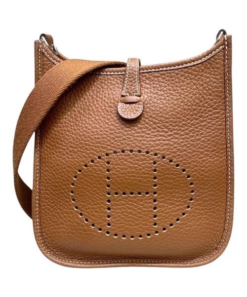HERMES EVELYNE TPM/SHW/TAURILLON CLEMENCE/GOLD: HERMES Evelyne TPM/SHW/Taurillon Clemence/Gold Brand: HERMES Type: Handbag Material: Taurillon Clemence Color: Gold / Brown Size: H:19.0cm / W:17.0cm / D:5.0cm Accessories: None Accessorie