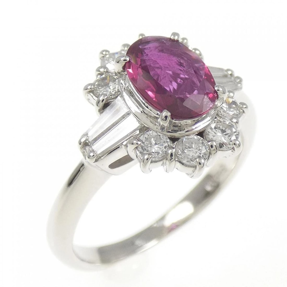 PT900 RUBY RING: PT900 Ruby Ring Brand: Unbranded Type: Ruby Ring Material: Platinum900, Main Stone/Creation RubySecondary Stone Diamond Color: Platinum Size: US 5 1/4 Accessories: None Accessories Notice: