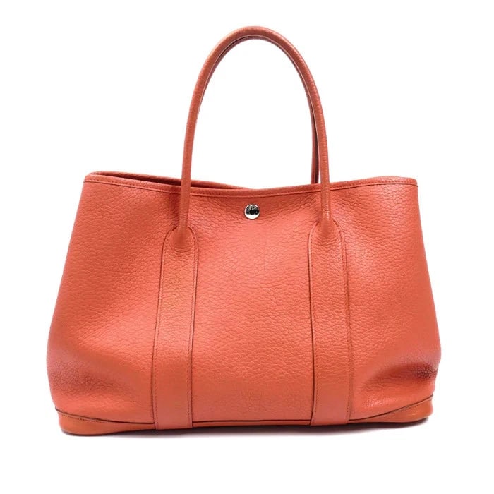 HERMES GARDEN PARTY 36 HANDBAG: HERMES Garden Party 36 Handbag Brand: HERMES Type: Handbag Material: Country Color: Rouge Pivoine Size: H26cm x D18cm Width at base: 36cm Handle: 42cm Accessories: None Accessories Notice: