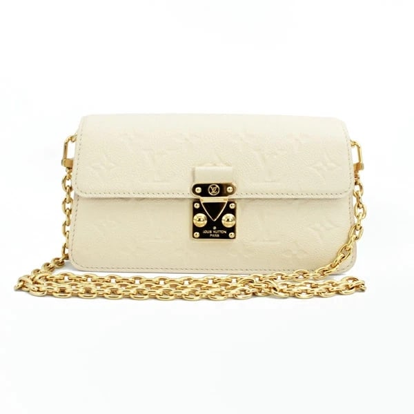 LOUIS VUITTON WALLET ON CHAIN METIS: Louis Vuitton Wallet on Chain Metis Brand: Louis Vuitton Type: Handbag Material: Monogram Empreinte Color: White Size: W: 21.5cm × H: 11cm × D: 3.8cm Accessories: None Accessories Notice: