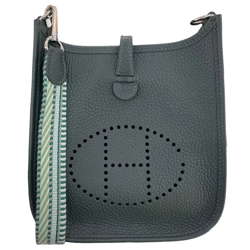 HERMES EVELYNE TPM TAURILLON SHOULDER BAG: Hermes Evelyne TPM Taurillon Shoulder Bag Brand: HERMES Type: Handbag Material: Taurillon Color: Veilmangrove // ??SV Hardware Size: W: 17cm / H: 18cm / D: 5cm Accessories: None Accessories Notice: