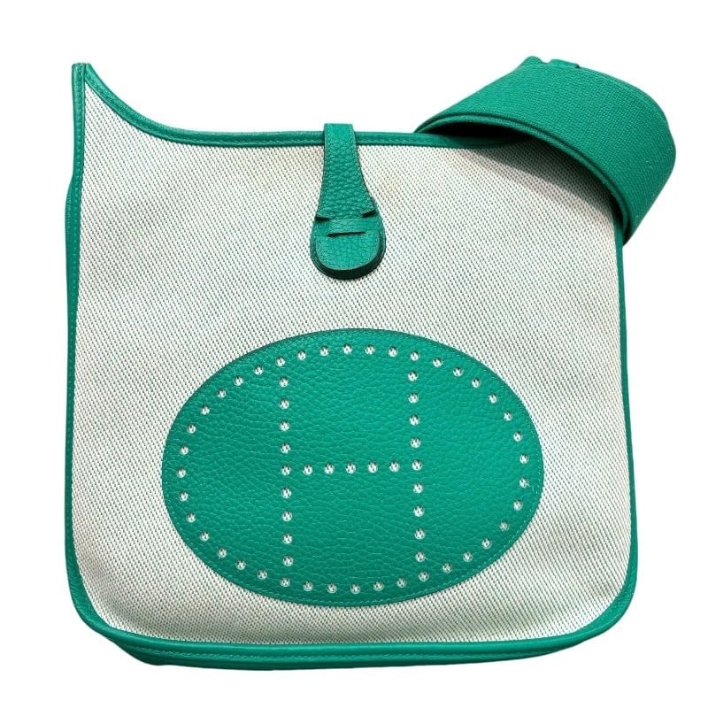 HERMES EVELYNE3 PM SHOULDER BAG: HERMES Evelyne3 PM Shoulder Bag Brand: HERMES Type: Handbag Material: Toile X Taurillon Clemence Color: Mint / SV Hardware Size: W: 28.5cm / H: 27cm / D: 8cm Accessories: None Accessories