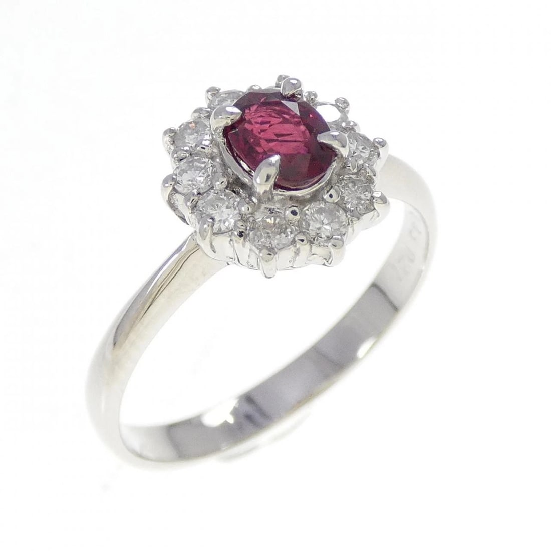 PT900 RUBY RING: PT900 Ruby Ring Brand: Unbranded Type: Ruby Ring Material: PT900, Main Stone/Creation Ruby Secondary StoneDiamond Color: Silver Size: US 6 1/4 Accessories: None Accessories Notice: When purchasing
