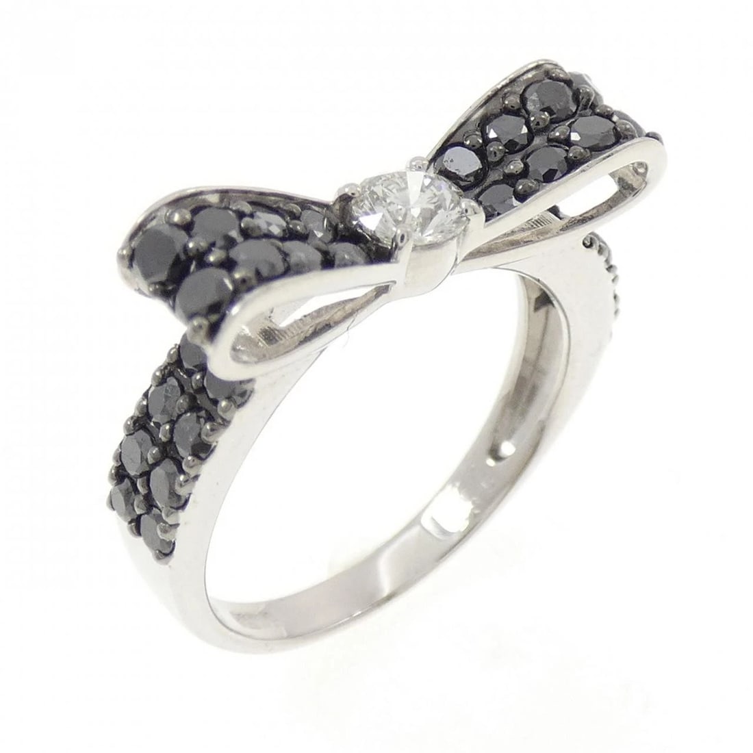 K18WG/K18BG RIBBON DIAMOND RING: K18WG/K18BG Ribbon Diamond Ring Brand: Unbranded Type: Diamond Ring Material: 18K white gold/18K black gold, Main Stone/Creation Natural Color: WG,BG Size: US 6 1/4 Accessories: None Accessories