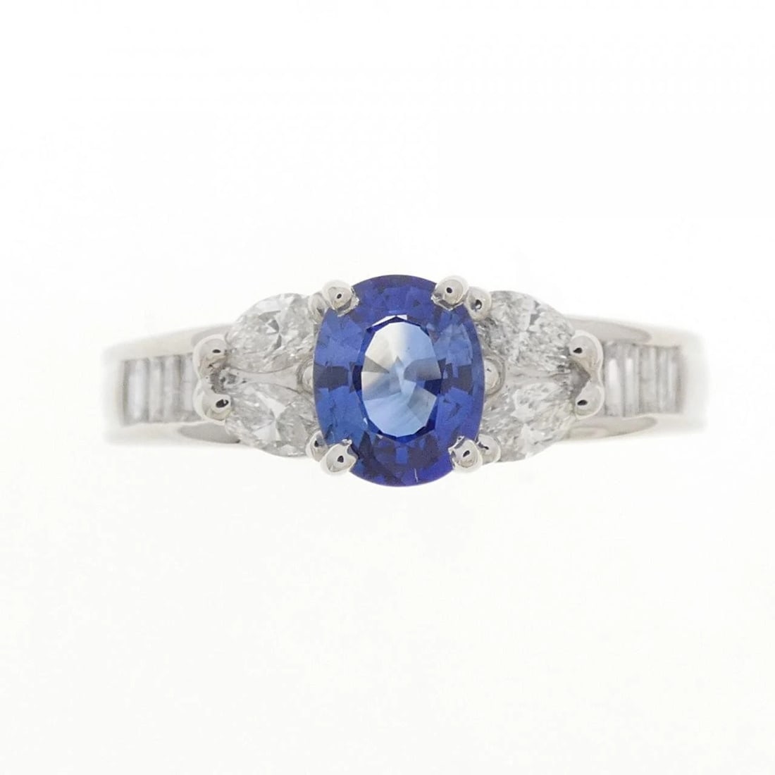 PT900 SAPPHIRE RING: PT900 Sapphire Ring Brand: Unbranded Type: Sapphire Ring Material: PT900, Main Stone/Creation Sapphire Secondary Stone Diamond Color: Silver Size: US 8.75 Accessories: None Accessories Notice: When
