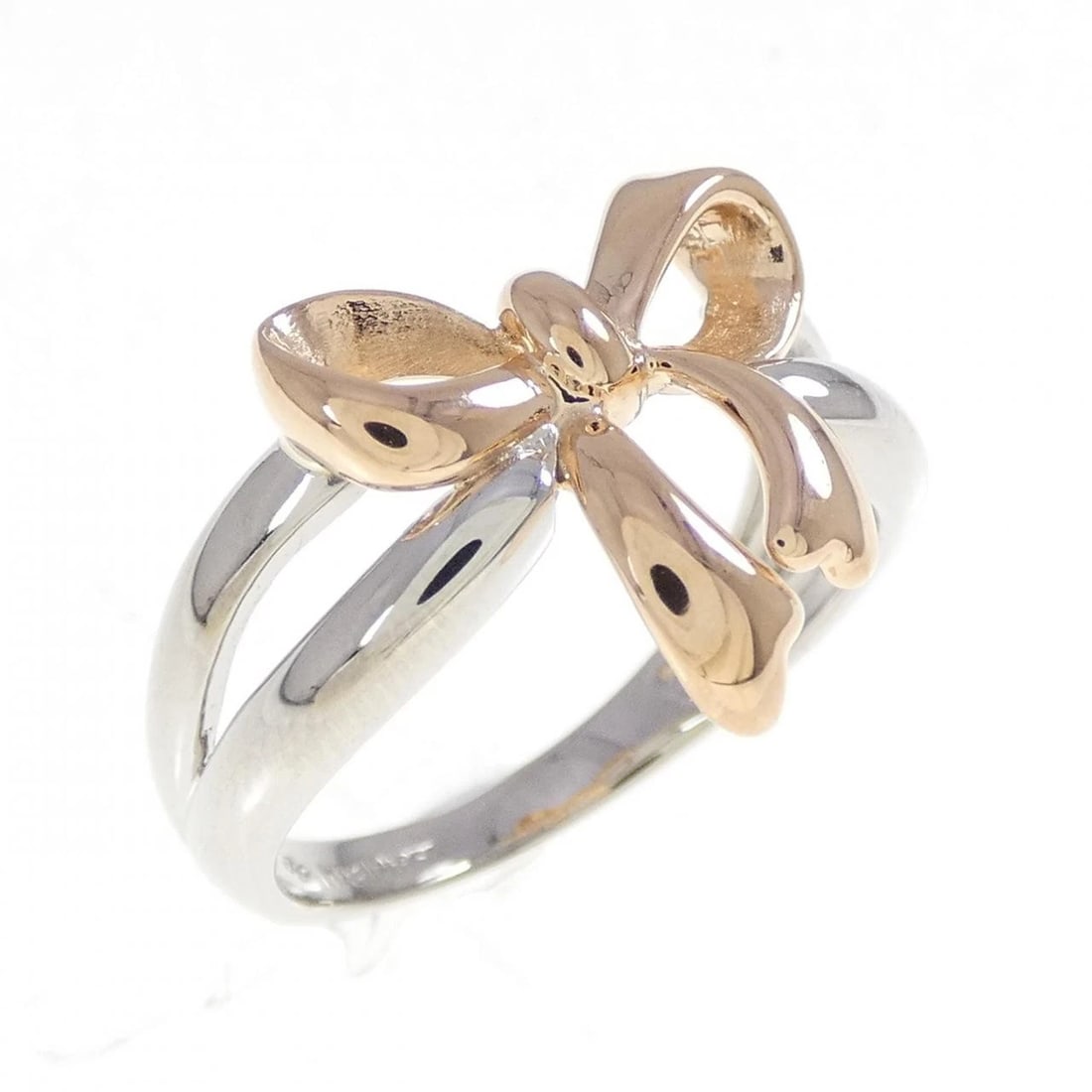 PT850/K18PG RIBBON RING: PT850/K18PG Ribbon Ring Brand: Unbranded Type: Ring Material: PT850/K18PG, Color: PG,Silver Size: US 6 Accessories: None Accessories Notice: When purchasing pre-owned goods, please refer to the