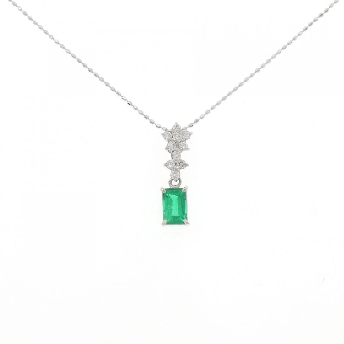 PT900/K18WG EMERALD NECKLACE: PT900/K18WG Emerald Necklace Brand: Unbranded Type: Emerald Necklace Material: Platinum90018k White Gold, Main Stone/Creation Emerald Secondary Stone Diamond Color: Platinum Size: Actual Size Pendant