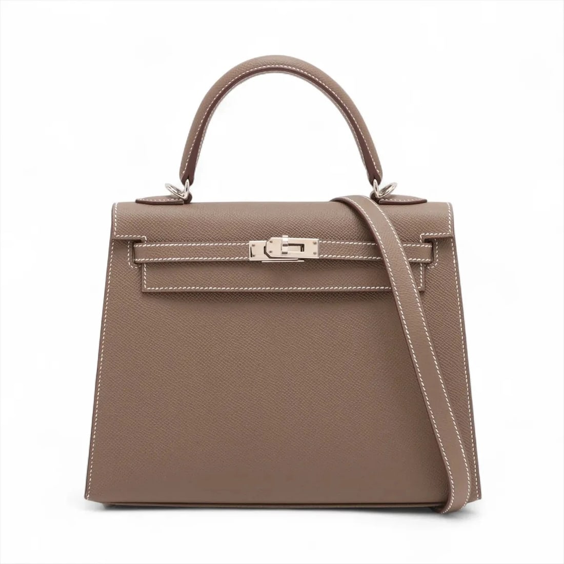 HERMES KELLY 25 SERIE VEAU EPSOM ETOUPE SILVER: Hermes Kelly 25 Serie Veau Epsom Etoupe Silver Brand: Hermès Type: Hand bag Material: Veau Epsom Color: Etoupe Size: Height:7.1inch Length:9.8inch Depth:3.7inch Handle height:3.1inch Accessories: