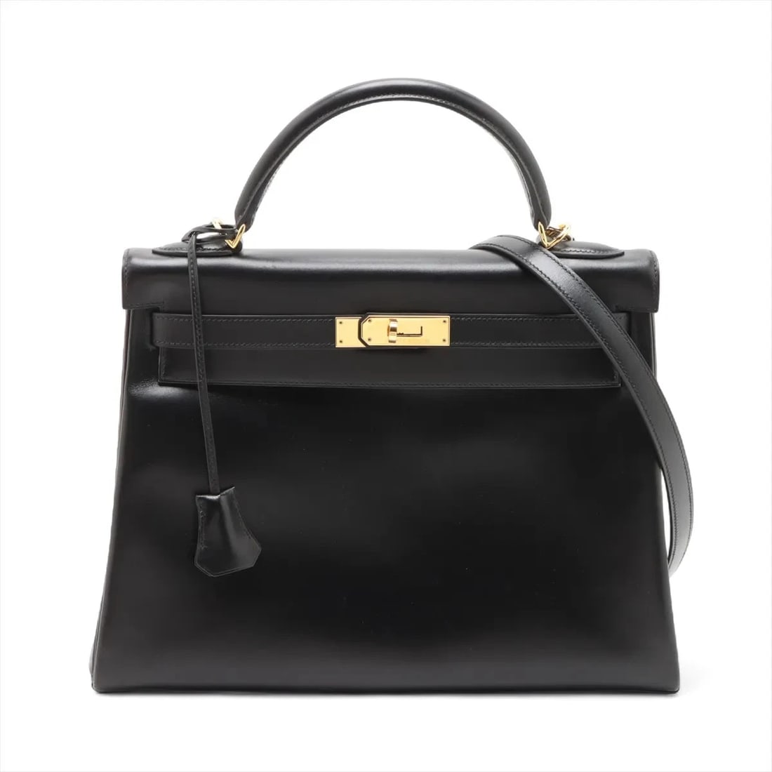 HERMES KELLY 32 SERIE BOX CALF BLACK GOLD: Hermes Kelly 32 Serie Box calf Black Gold Brand: Hermès Type: Hand bag Material: Box calf Color: Black Size: Height:9.1inch Length:12.4inch Depth:4.5inch Handle height:3.1inch Accessories: None