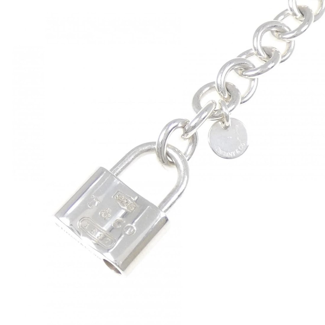 TIFFANY&CO. LOCK CHARM BRACELET: TIFFANY&Co. Lock Charm Bracelet Brand: TIFFANY&Co. Type: TIFFANY & Co. Bracelet Material: 925Silver, Color: Silver Size: Actual Size Max width approx: 20.5mm Size 18.5cm Accessories: None Accessories