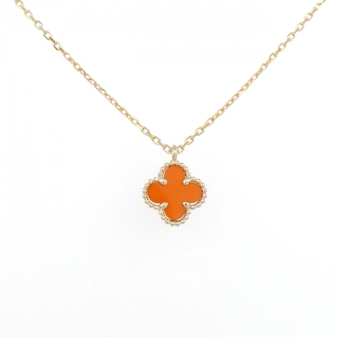 VAN CLEEF & ARPELS SWEET ALHAMBRA NECKLACE: Van Cleef & Arpels Sweet Alhambra Necklace Brand: Van Cleef & Arpels Type: Van Cleef & Arpels Necklace Material: 750 Pink Gold, Main Stone/Creation Carnelian Color: Pink Gold Size: Actual Size