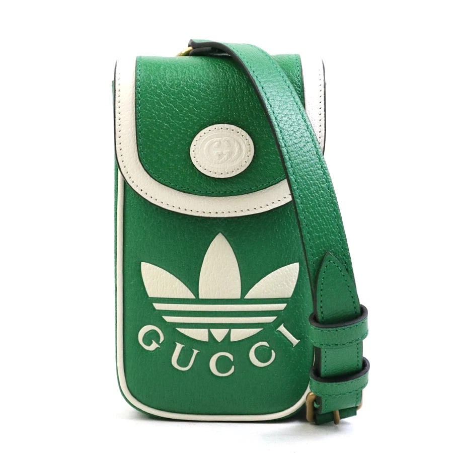 GUCCI X ADIDAS CROSSBODY SHOULDER BAG GREEN/WHITE: GUCCI x adidas Crossbody Shoulder Bag Green/White Brand: GUCCI Type: Shoulder Bag Material: Leather Color: Green Size: W:4.1inx H:6.7inx D:1.4in Accessories: None Accessories Notice: When