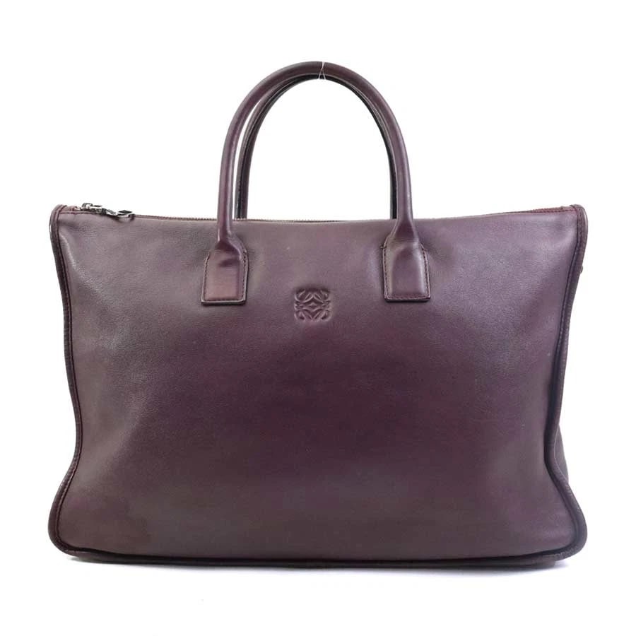 LOEWE ANAGRAM HANDBAG BURGUNDY LEATHER: LOEWE Anagram Handbag Burgundy Leather Brand: LOEWE Type: Handbag Material: Leather Color: Burgundy Size: W:15.7inx H:11.8inx D:2.8in Handle drop:4.3in Accessories: None Accessories Notice