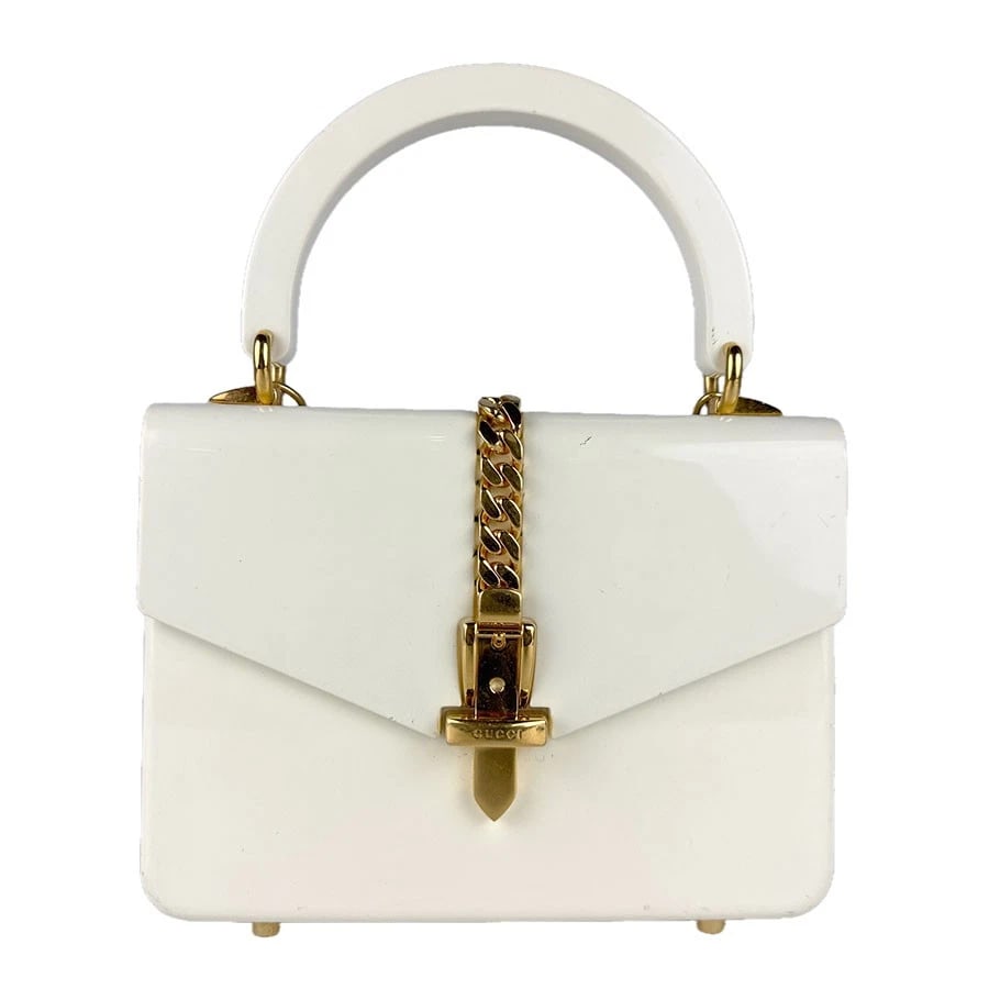 GUCCI SYLVIE HANDBAG SHOULDER BAG OFF WHITE: GUCCI Sylvie Handbag Shoulder Bag Off White Brand: GUCCI Type: Handbag Material: Acrylic/Metal Color: Off White Size: W:7.9inx H:5.9inx D:2.0in Handle Length:11.4in Accessories: None Acces