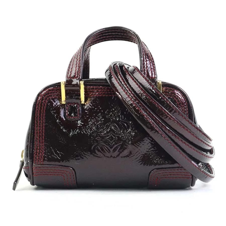 LOEWE AMAZONA MICRO MINI CROSSBODY SHOULDER BAG: LOEWE Amazona Micro Mini Crossbody Shoulder Bag Brand: LOEWE Type: Crossbody Shoulder Bag Material: Patent Leather Color: Burgundy Size: W:4.9inx H:3.1inx D:2.2in Handle drop:2.0in Accessories: No