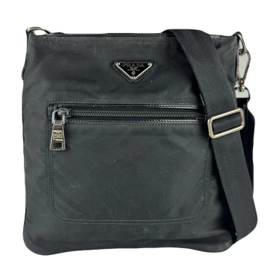 PRADA CROSSBODY SHOULDER BAG BLACK NYLON/SILVERTONE: PRADA Crossbody Shoulder Bag Black Nylon/Silvertone Brand: PRADA Type: Crossbody Shoulder Bag Material: Nylon Color: Black Size: W:9.1inx H:9.8inx D:0.4in Accessories: None Accessories Not
