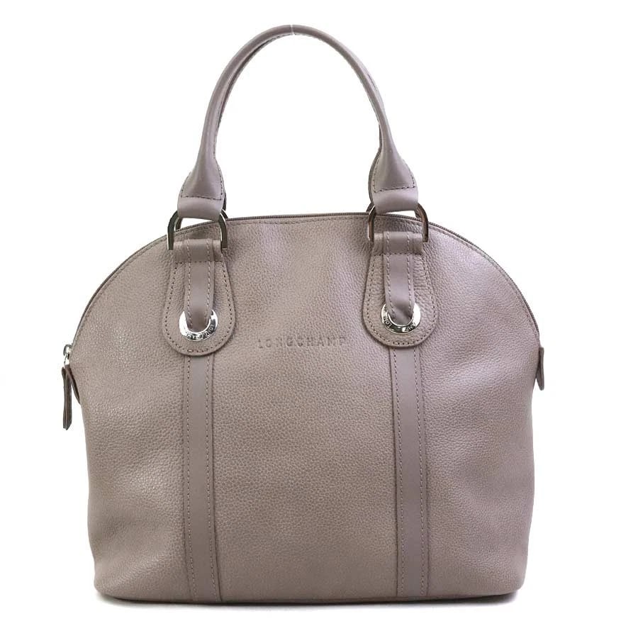LONGCHAMP HANDBAG GREIGE LEATHER: Longchamp Handbag Greige Leather Brand: Longchamp Type: Handbag Material: leather Color: Greige Size: W:10.6inx H:9.8inx D:5.1in Handle Length:11.8in Accessories: None Accessories Notice: When