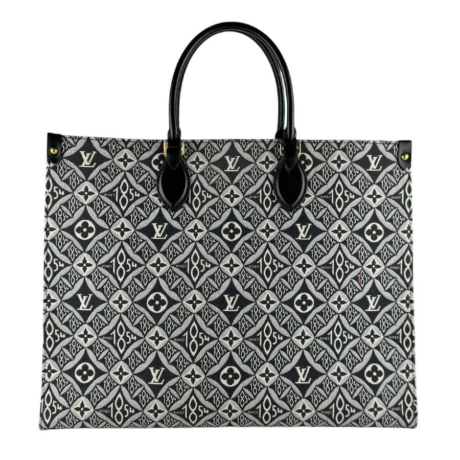 LOUIS VUITTON JACQUARD ON THE GO GM HANDBAG: LOUIS VUITTON Jacquard On The Go GM Handbag Brand: LOUIS VUITTON Type: Handbag Material: Canvas/Leather Color: Black / Grey / White Size: W:16.1inx H:12.6inx D:6.7in Handle Length:13.8in Accessori