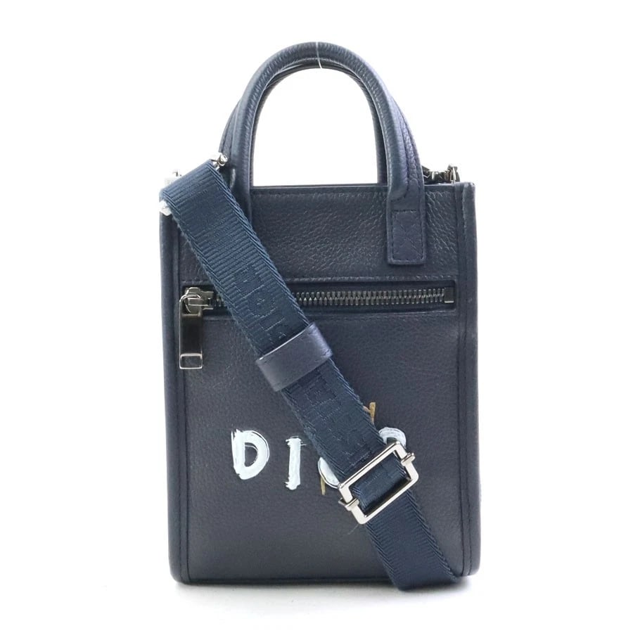 CHRISTIAN DIOR X OTANI WORKSHOP SHOULDER BAG: Christian Dior x OTANI WORKSHOP Shoulder Bag Brand: Christian Dior Type: Shoulder Bag Material: leather Color: Navy Size: W:5.3inx H:6.7inx D:2.0in Handle Length:7.5in Accessories: None Ac