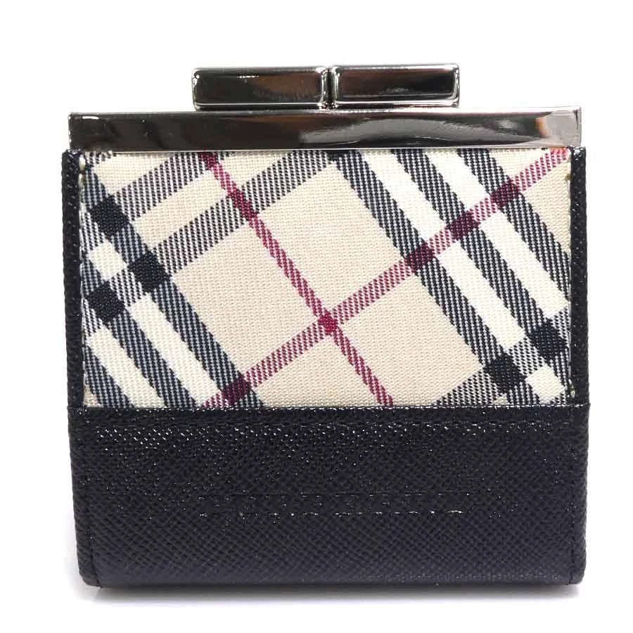 BURBERRY COIN PURSE CASE LEATHER/NYLON CANVAS: BURBERRY Coin Purse Case Leather/Nylon Canvas Brand: BURBERRY Type: Coin case Material: Leather/Nylon Canvas Color: Black / Beige Size: W:3.0inx H:3.1inx D:0.6in Accessories: None Accessor