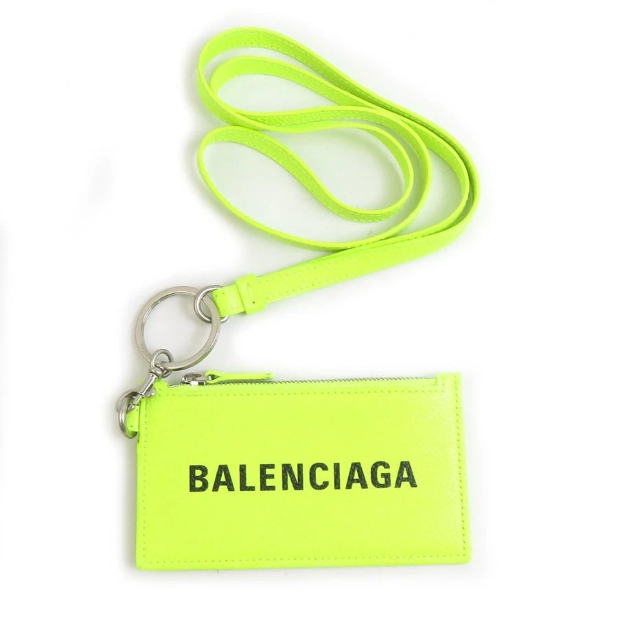 BALENCIAGA COIN PURSE CASE NEON LEATHER: BALENCIAGA Coin Purse Case Neon Leather Brand: BALENCIAGA Type: Coin case Material: Leather Color: Neon Yellow Size: W:5.0inx H:2.9in Accessories: None Accessories Notice: When purchasing