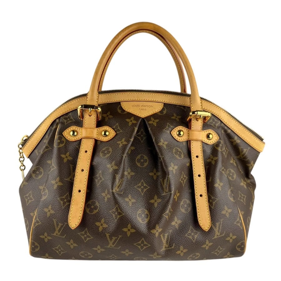 LOUIS VUITTON MONOGRAM TIVOLI GM HANDBAG: LOUIS VUITTON Monogram Tivoli GM Handbag Brand: LOUIS VUITTON Type: Handbag Material: Monogram Canvas Color: Brown Size: W:12.6inx H:11.0inx D:7.1in Handle Length:28.3in Accessories: None