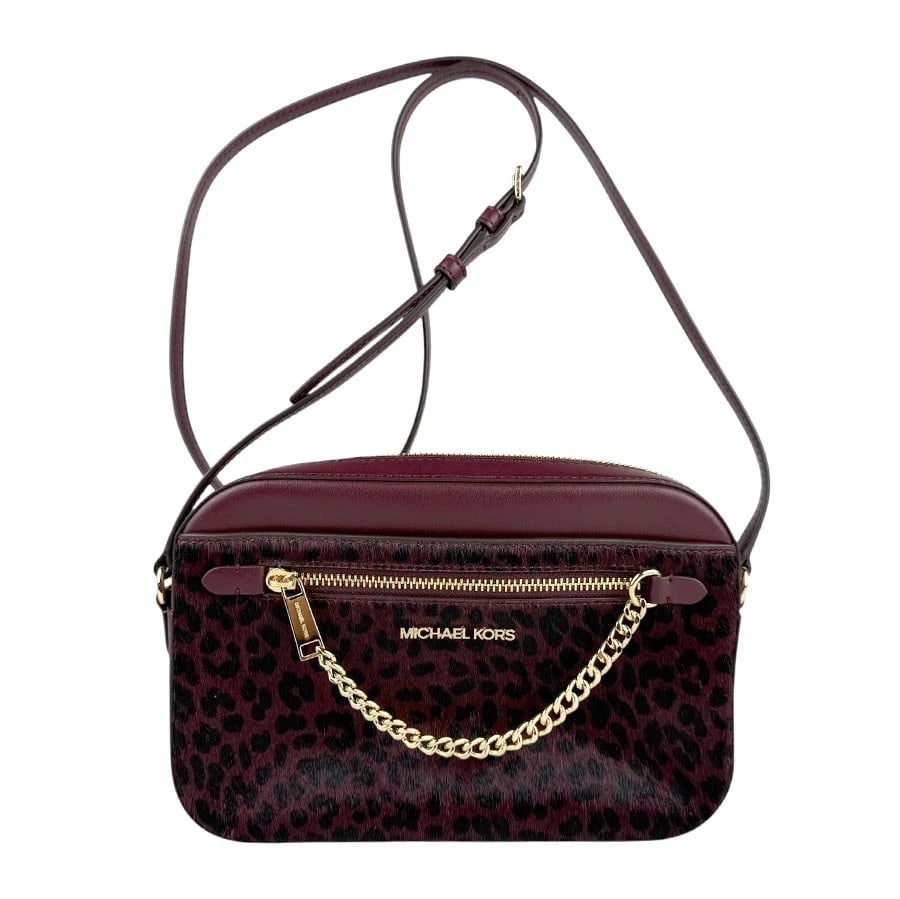 MICHAEL KORS LEOPARD CROSSBODY SHOULDER BAG: Michael Kors Leopard Crossbody Shoulder Bag Brand: Michael Kors Type: Crossbody Shoulder Bag Material: Pony Hair/Leather Color: Burgundy/Black Size: W:9.1inx H:6.3inx D:2.0in Accessories: None