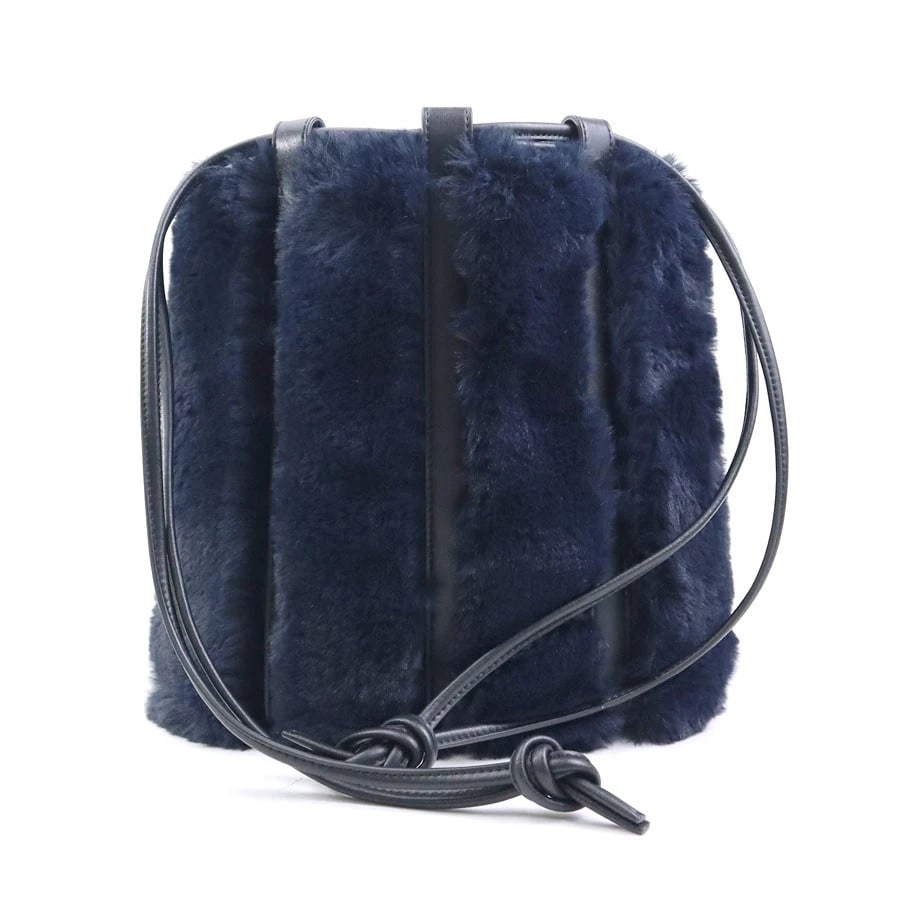 VASIC SHOULDER BAG NAVY/BLACK FUR/LEATHER: VASIC Shoulder Bag Navy/Black Fur/Leather Brand: VASIC Type: Shoulder Bag Material: Fur/Leather Color: Navy X Black Size: W:9.1inx H:9.8inx D:3.9in Accessories: None Accessories Notice: Wh
