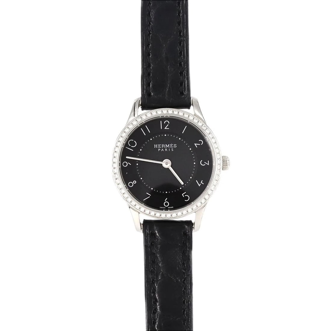 HERMES SLIM STAINLESS STEEL QUARTZ WATCH: Hermes Slim Stainless Steel Quartz Watch Brand: HERMES Type: Wrist watch Material: Case: Stainless Steel Bracelet: Strap Color: Dial Color: Black/Arabic Band Color: Black Size: Case diameter: Approx.