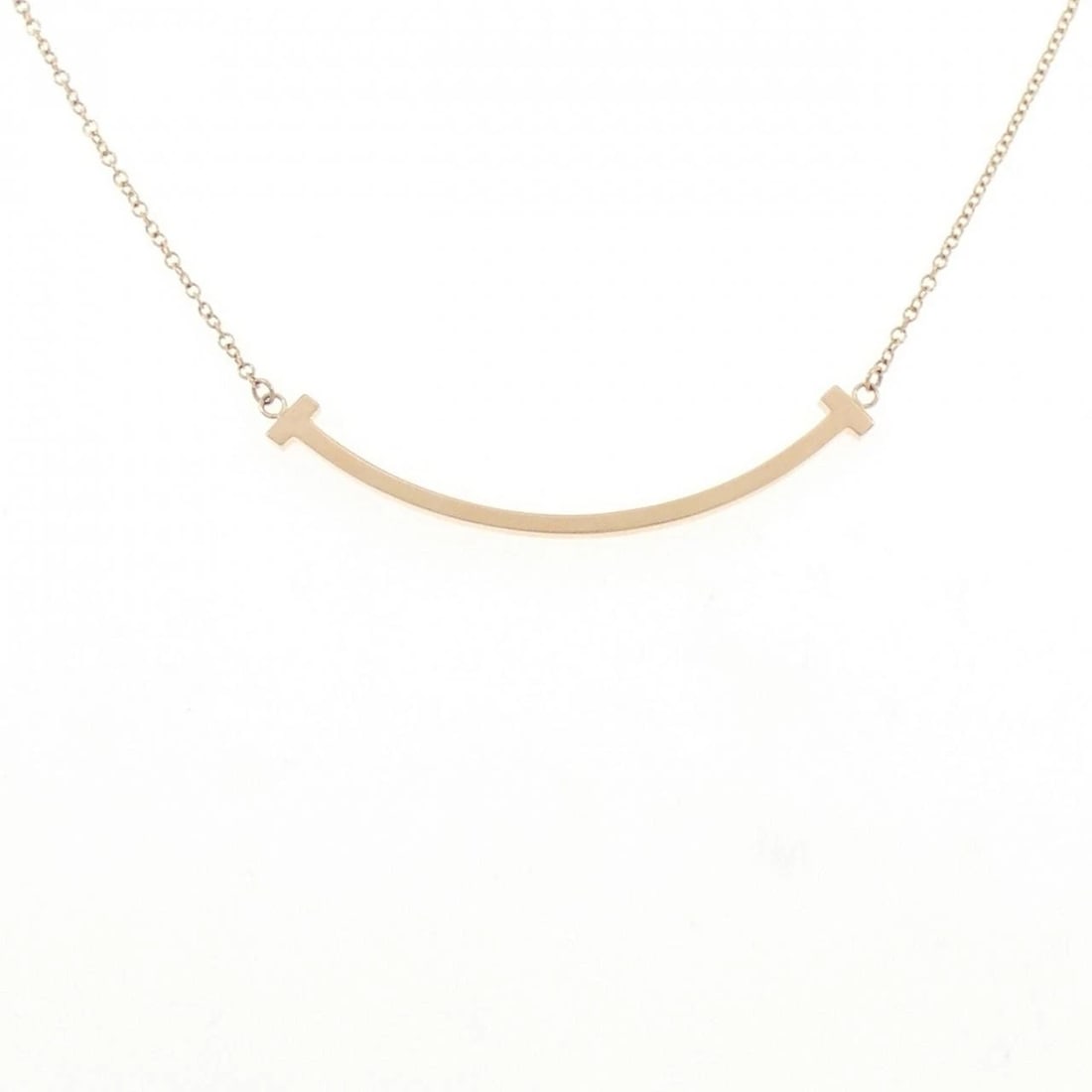 TIFFANY&CO. T SMILE SMALL NECKLACE: TIFFANY&Co. T Smile Small Necklace Brand: TIFFANY&Co. Type: TIFFANY&Co. Necklace Material: 750 Pink Gold , Color: Pink Gold Size: Actual Size Pendant length approx. x width approx.: 3.6mmx37.5mm Chain