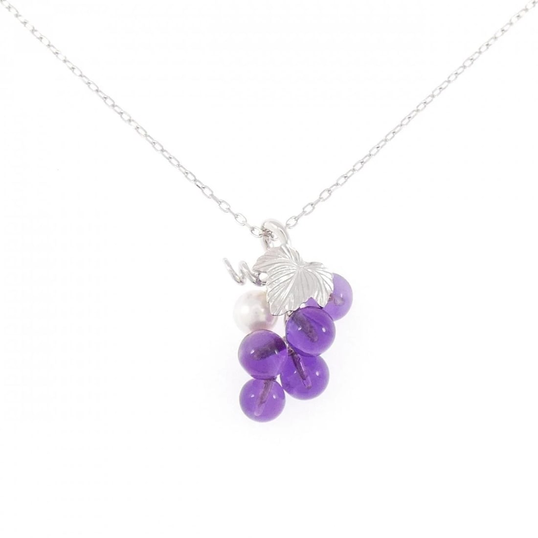 MIKIMOTO CHRISTMAS CHARITY NECKLACE: Mikimoto Christmas Charity Necklace Brand: MIKIMOTO Type: Mikimoto Necklace Material: 750 White Gold, Main Stone/Creation Amethyst Secondary Stone Akoya Pearl Color: White Gold Size: Actual Size