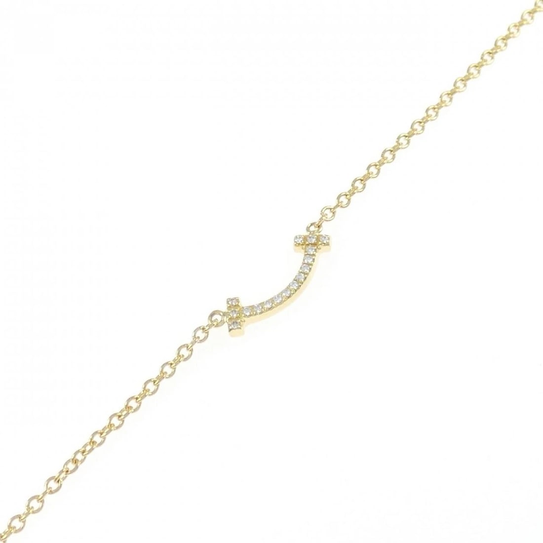 TIFFANY & CO. T SMILE MINI BRACELET: TIFFANY & Co. T Smile Mini Bracelet Brand: TIFFANY&Co. Type: TIFFANY & Co. Bracelet Material: 750 Yellow Gold, Main Stone/Creation Natural Color: Yellow Gold Size: Actual Size Max width approx: