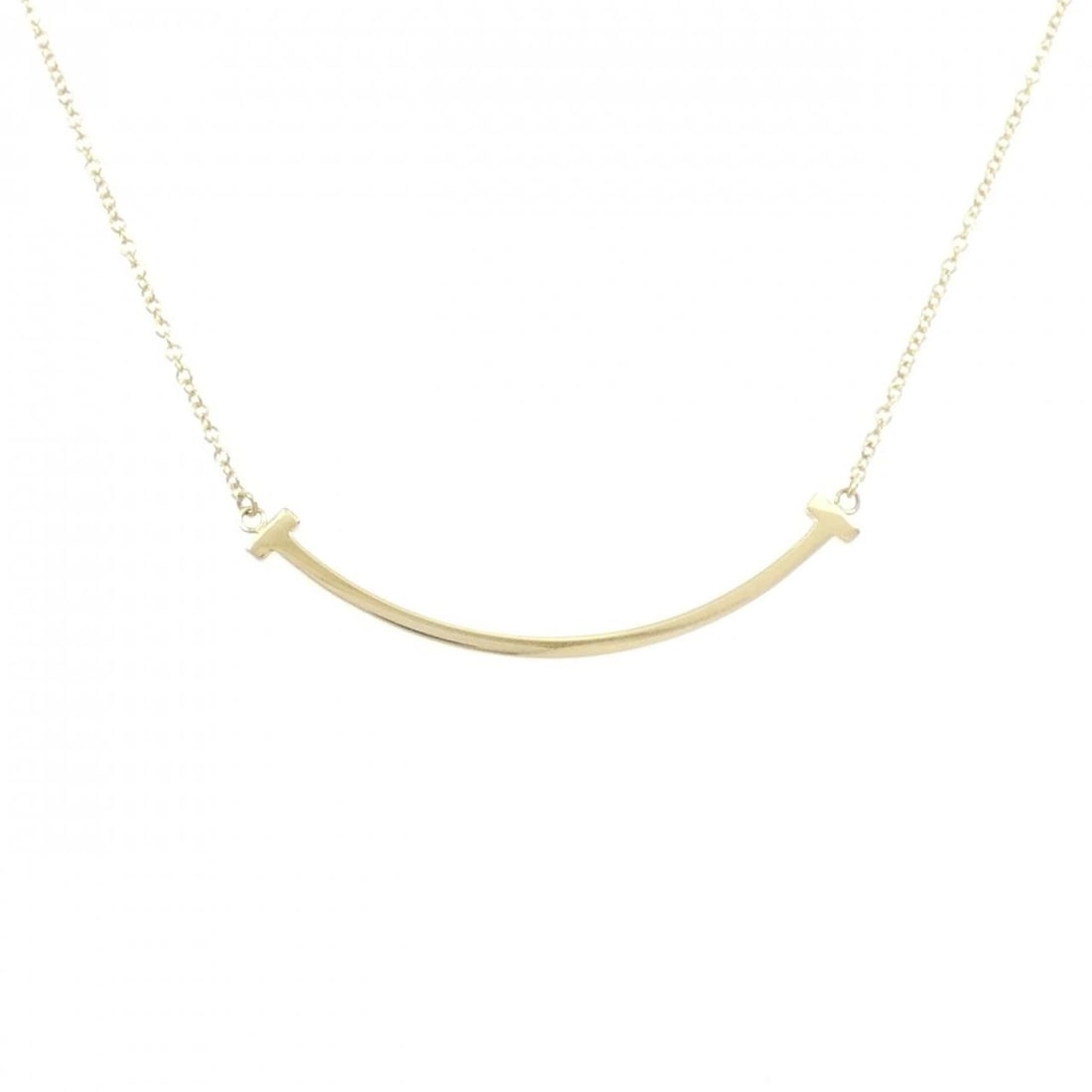 TIFFANY&CO. T SMILE SMALL NECKLACE: TIFFANY&Co. T Smile Small Necklace Brand: TIFFANY&Co. Type: TIFFANY&Co. Necklace Material: 750 Yellow Gold, Color: Yellow Gold Size: Actual Size Pendant length approx. x width approx.: 3.6mmx36.8mm