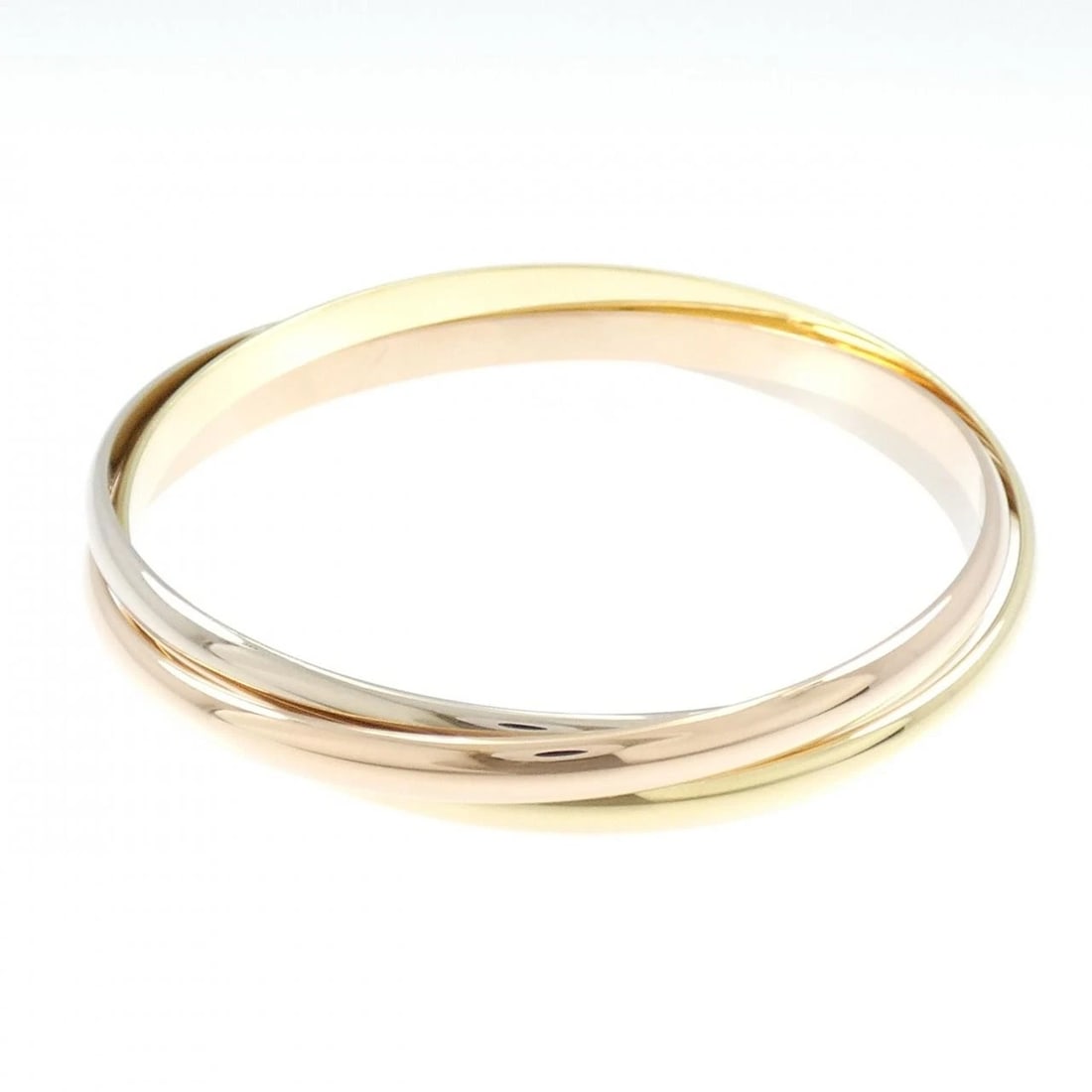 CARTIER TRINITY BANGLE: Cartier Trinity Bangle Brand: CARTIER Type: Cartier Bracelets Material: 750 Yellow Gold/750 White Gold/750 Pink Gold, Color: Yellow Gold White Gold/Pink Gold Size: Actual Size Max width approximately: