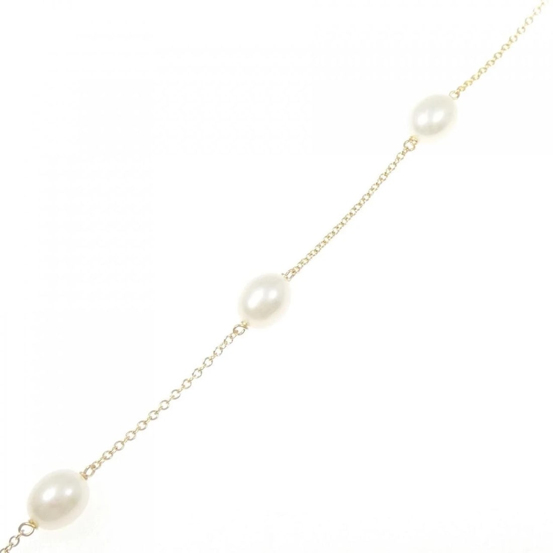 TIFFANY & CO. PEARL BY THE YARD BRACELET: TIFFANY & Co. Pearl by the Yard Bracelet Brand: TIFFANY&Co. Type: TIFFANY & Co. Bracelet Material: 750 yellow gold, Main Stone/Creation Freshwater Pearl Color: yellow gold Size: Actual Size Max width