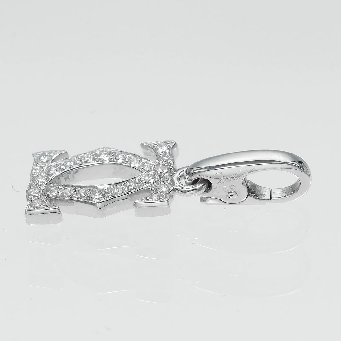 CARTIER 2C CHARM PENDANT TOP: CARTIER 2C charm Pendant top Brand: CARTIER Type: Pendant top Material: K18 white gold, Color: Silver Size: Top?W0.3inch x H1.0inch Size(CM) Top?W8.5mm x H24.7mm Accessories: None Accessories Notice: