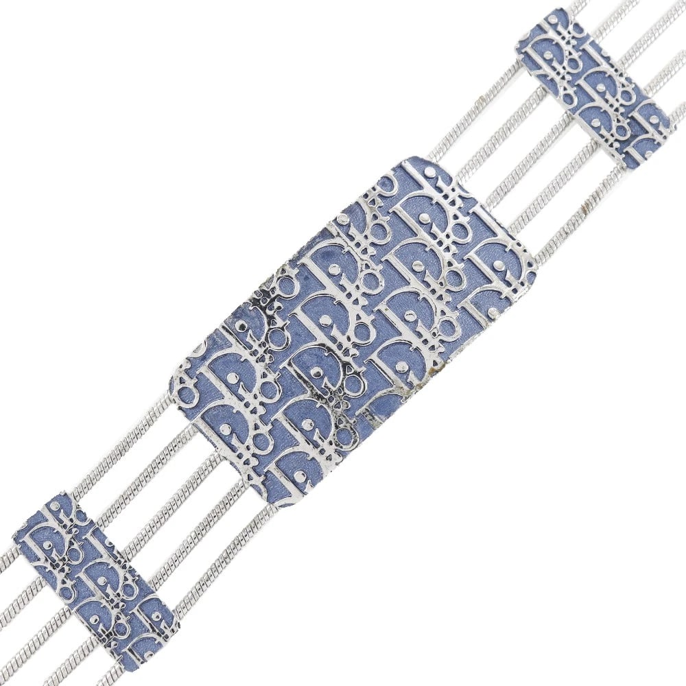 DIOR TROTTER CHOKER 5 HOOKS SILVER/BLUE METALLIC: Dior Trotter choker 5 hooks Silver/Blue metallic Brand: Dior Type: choker Material: metallic, Color: Silver Size: Neck around?12.8inch Top?W2.0inch x H1.0inch Size(CM) Neck around?32.5?37.0cm Top?W51m