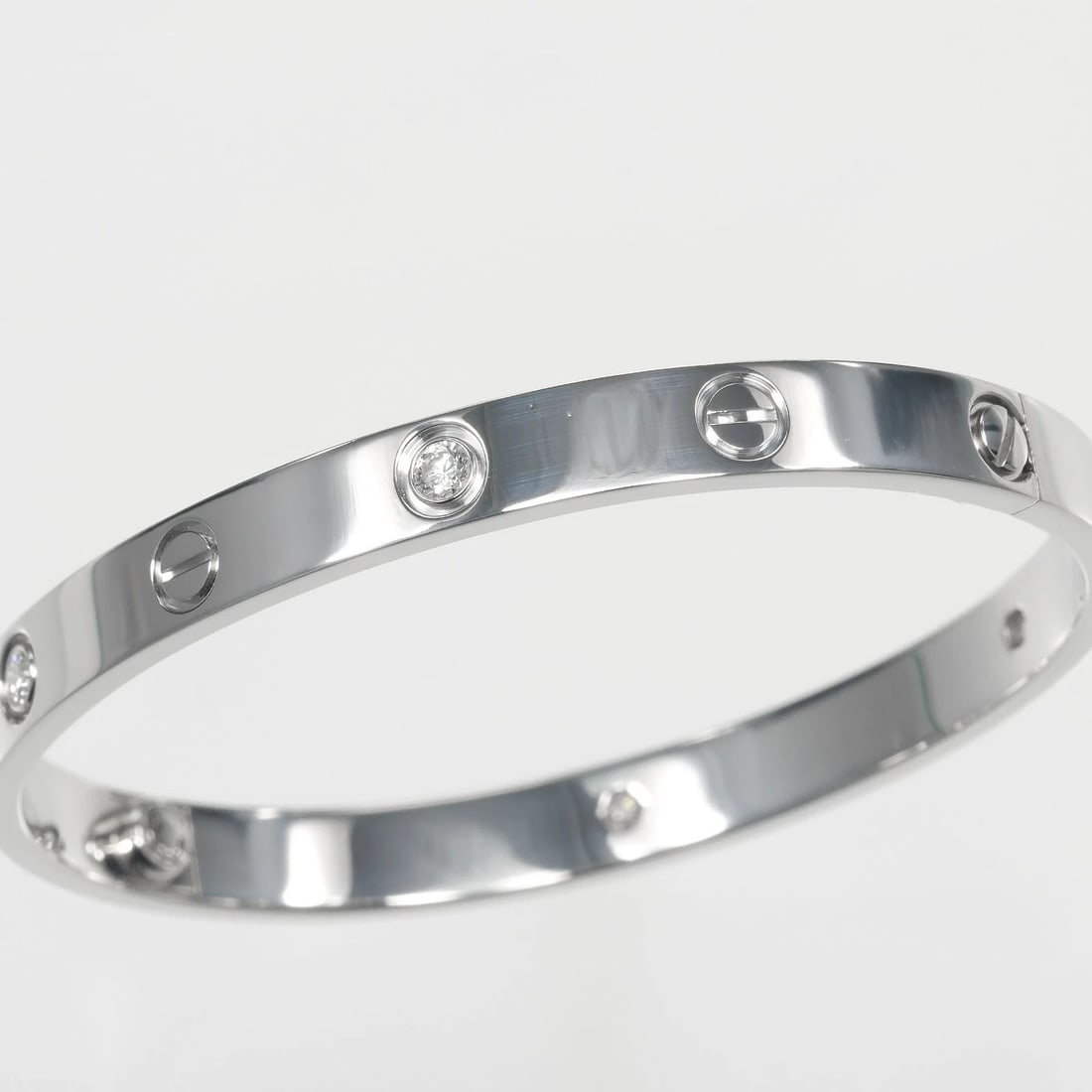 CARTIER LOVE BRACELET K18 WHITE GOLD: CARTIER love Bracelet K18 white gold Brand: CARTIER Type: Bracelet Material: K18 white gold, Color: Gold Size: Band: 0.2" Drop: 6.3" Accessories: None Accessories Notice: When purchasing pre-owned