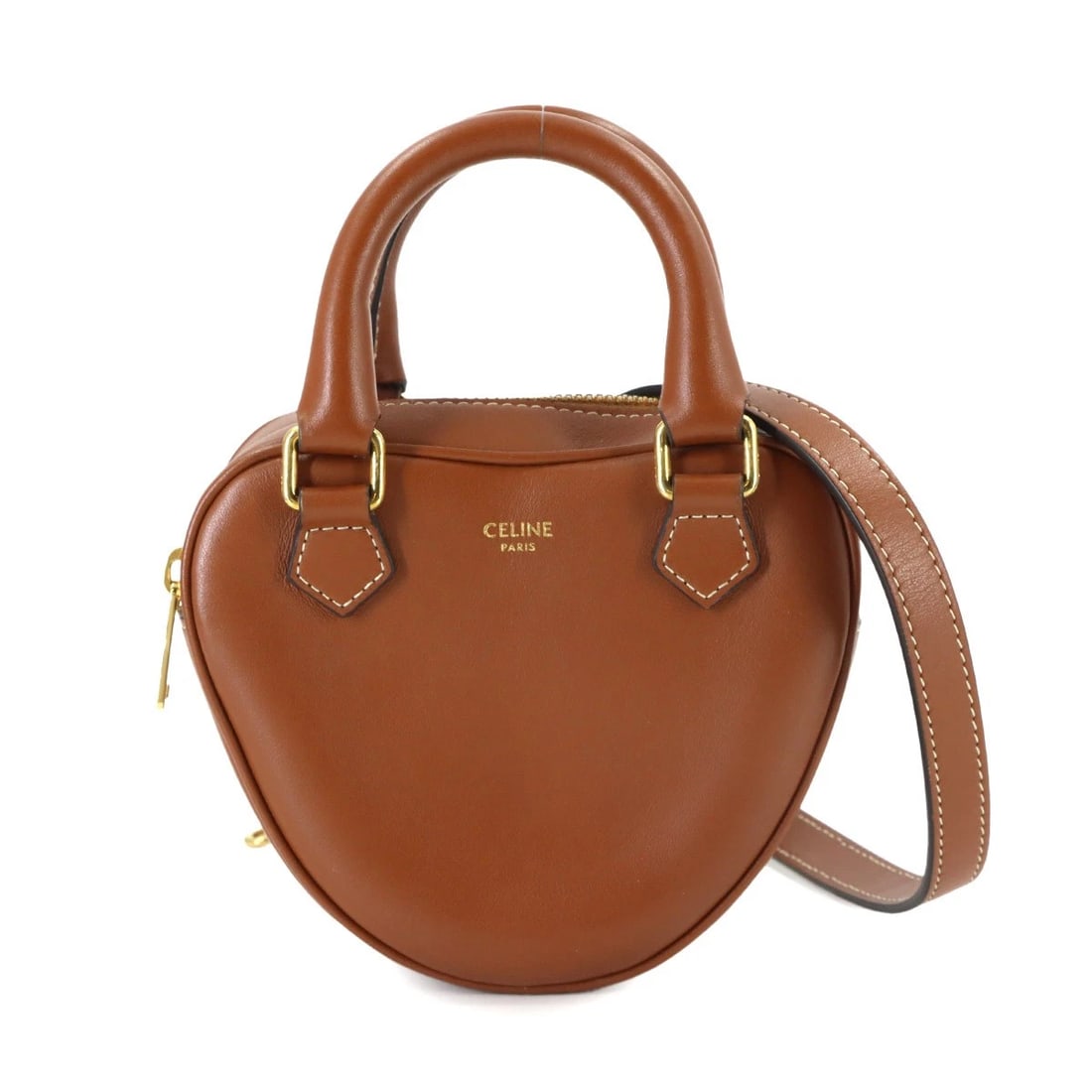 CELINE MEDIUM HEART 2WAY HAND SHOULDER BAG: CELINE Medium Heart 2way Hand Shoulder Bag Brand: CELINE Type: Hand Bag / Shoulder Bag Material: Leather Color: Tan Size: W 3.15 inch, H 4.72 inch, D 2.17 inch Accessories: None Accessorie