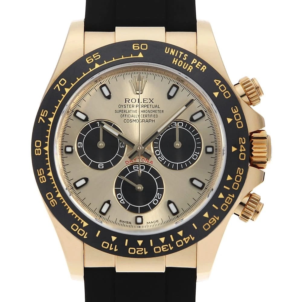 ROLEX COSMOGRAPH DAYTONA CHAMPAGNE X BLACK WATCH: ROLEX Cosmograph Daytona Champagne x black Watch Brand: ROLEX Type: Wrist watch Material: Band Material rubber, Case Material Yellow Gold(K18) Color: Dial Colour Champagne and Black Size: Case:W40mm C