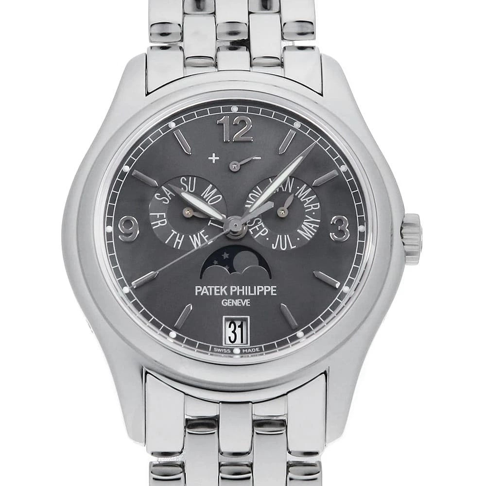 PATEK PHILIPPE ANNUAL CARRENDER WATCH: PATEK PHILIPPE Annual Carrender Watch Brand: PATEK PHILIPPE Type: Wrist watch Material: Band Material White Gold, Case Material White Gold Color: Dial Colour Gray Size: Case:W39mm Circumference of