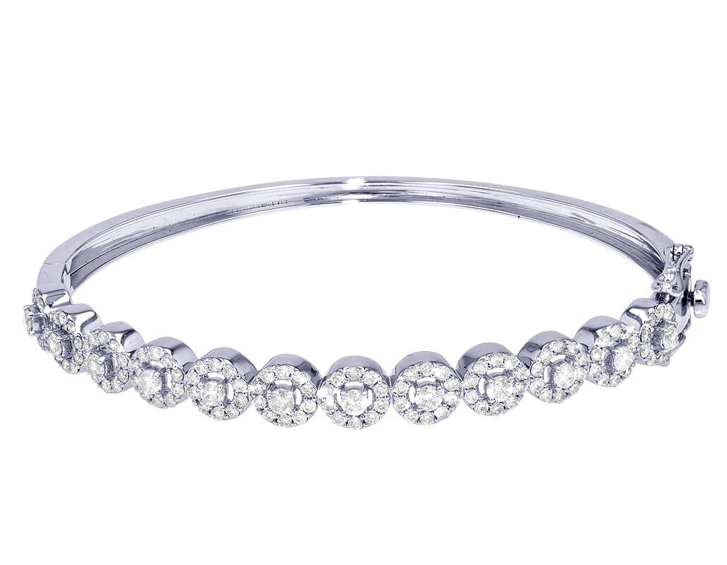 LADIES HALO BANGLE DIAMOND BRACELET 10K WHITE GOLD: Ladies Halo Bangle Diamond Bracelet 10k White Gold Brand: None Type: Bracelet Material: 10k White Gold, Main Stone/Creation Natural Color: White Gold Size: Length 7 in Width 6mm Accessories: None