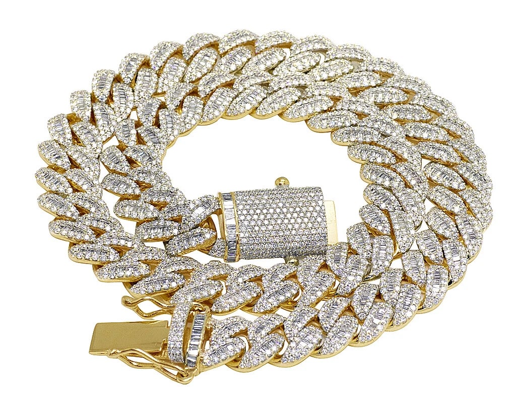 BAGUETTE DIAMOND MIAMI CUBAN CHAIN NECKLACE 10K YELLOW GOLD: Baguette Diamond Miami Cuban Chain Necklace 10K Yellow Gold Brand: None Type: Necklace Material: 10K Yellow Gold, Main Stone/Creation Natural Color: Yellow Gold Size: Length 24" Width 14MM Accesso